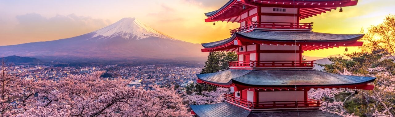mt fuji in background and temple in foroground